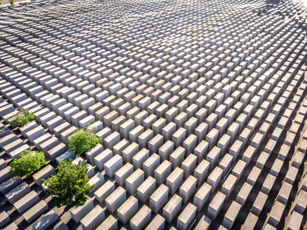 Aerial view of the Memorial to the Murdered Jews of Europe in Berlin, a vast field of concrete stelae.