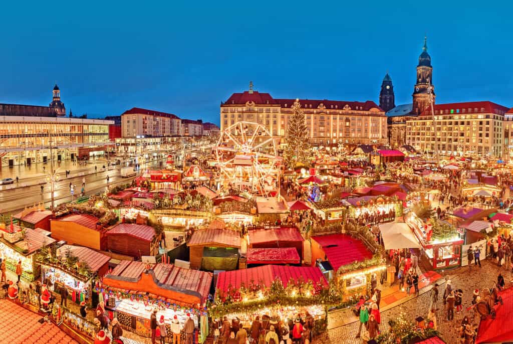 Dresden Christmas Market, Germany. Illuminated stalls, squares, and festive atmosphere in the central square.