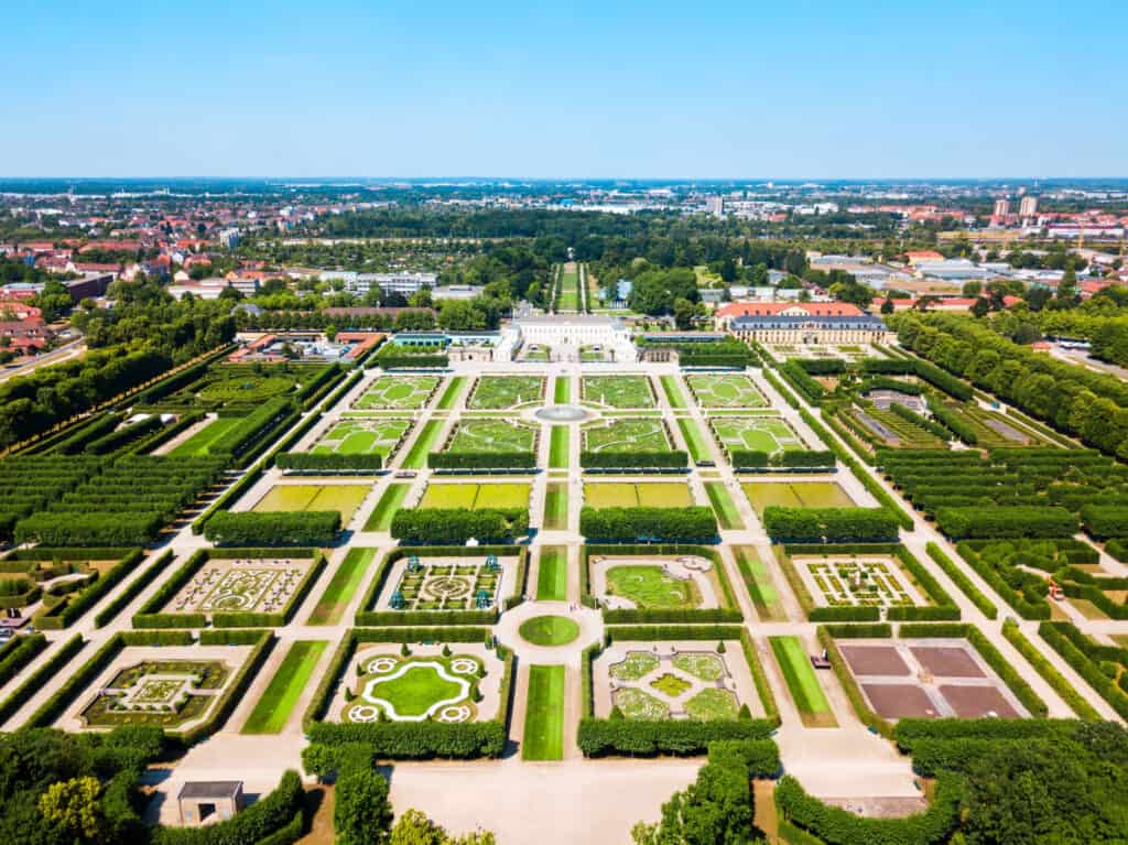 Aerial view of Herrenhausen Gardens in Hanover, showcasing intricate garden layouts