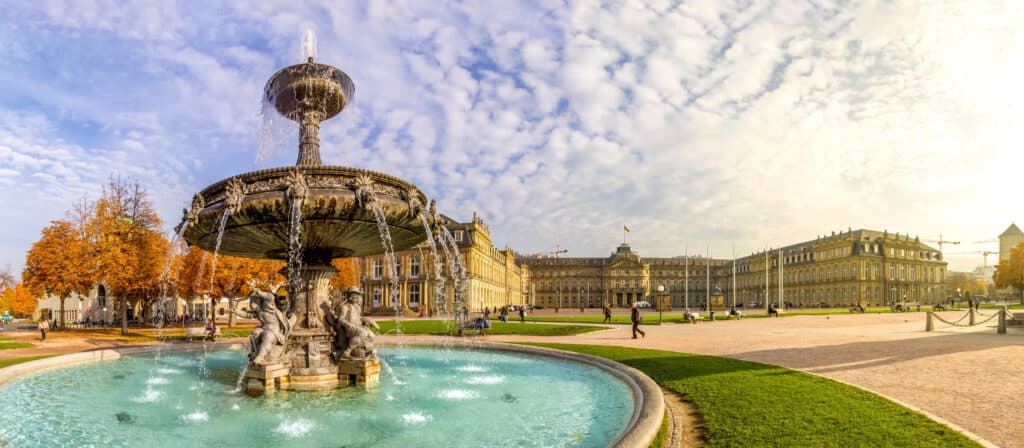 Stuttgart Schlossplatz, featuring the grand palace and bustling public square.