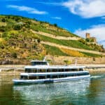 Cruise ship by Schloss Ehrenfels in the Upper Middle Rhine Valley. UNESCO World Heritage in Germany.