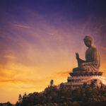 The imposing Tian Tan Buddha statue in Hong Kong, seated serenely atop Ngong Ping plateau.