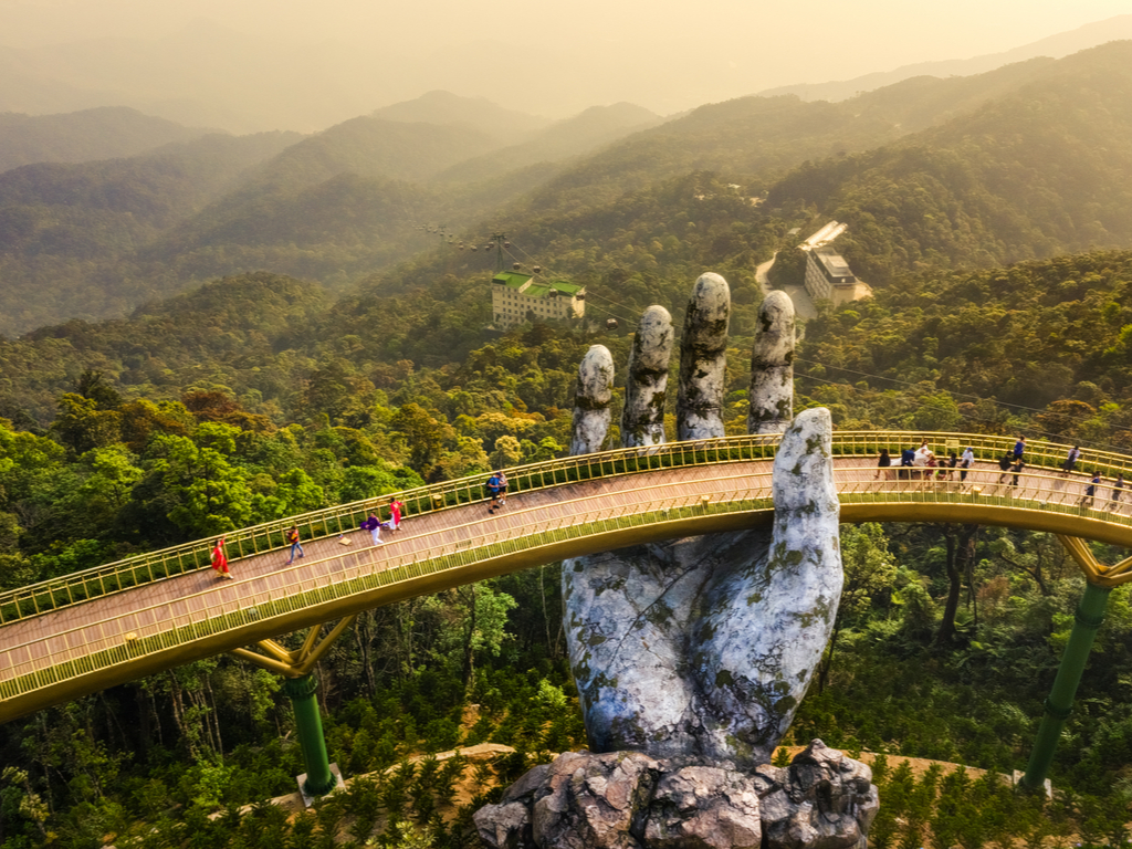 Misty morning view of the Giant Hand Bridge, creating a mystical atmosphere in the Ba Na Hills.