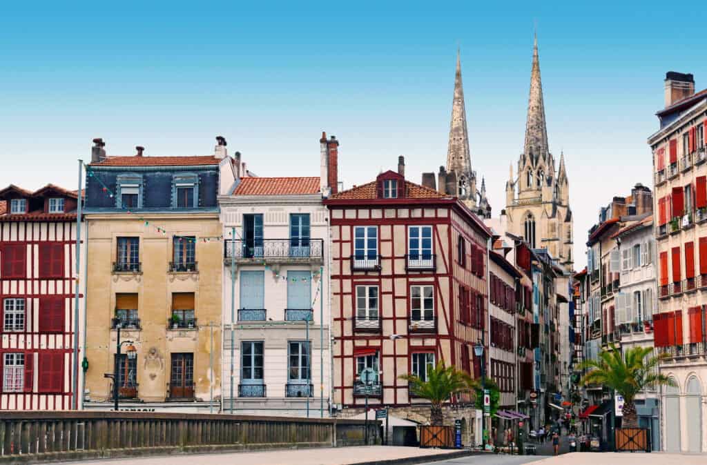 Historic old houses lining the streets of Bayonne in the French Basque Country, showcasing traditional architecture.