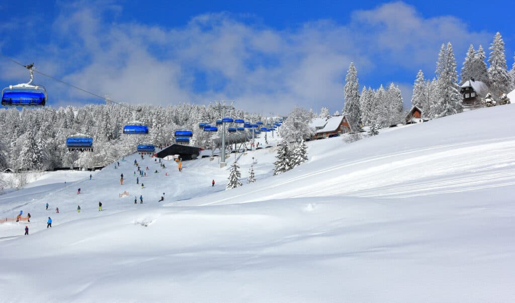Winter Sports Enthusiasts Skiing at Feldberg in the Black Forest, Germany