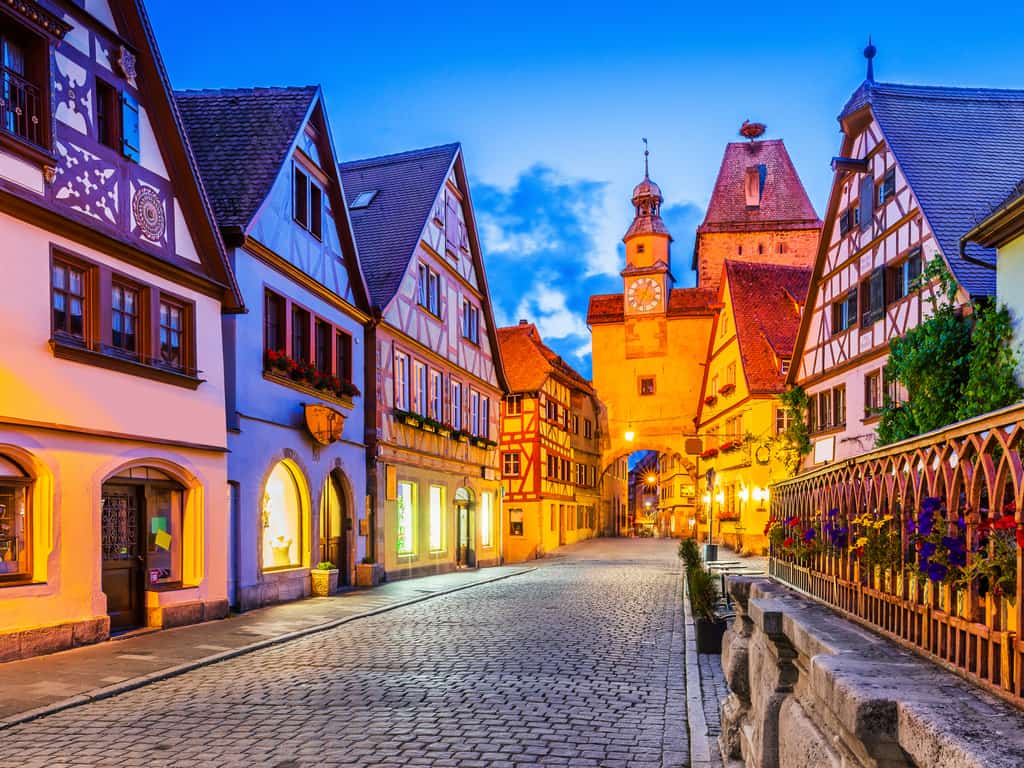 Medieval half-timbered houses and cobblestone streets in Rothenburg ob der Tauber, Germany.