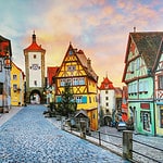 "The iconic Plönlein corner in Rothenburg ob der Tauber, with its timbered buildings and narrow streets.