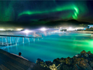 Nighttime view of the Blue Lagoon, illuminated for a tranquil and mystical experience.