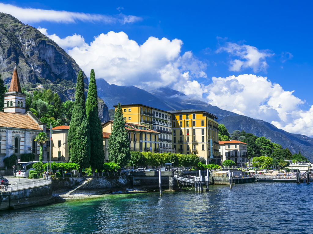 Panoramic view of Lake Como with its crystal-clear waters and surrounding mountains.