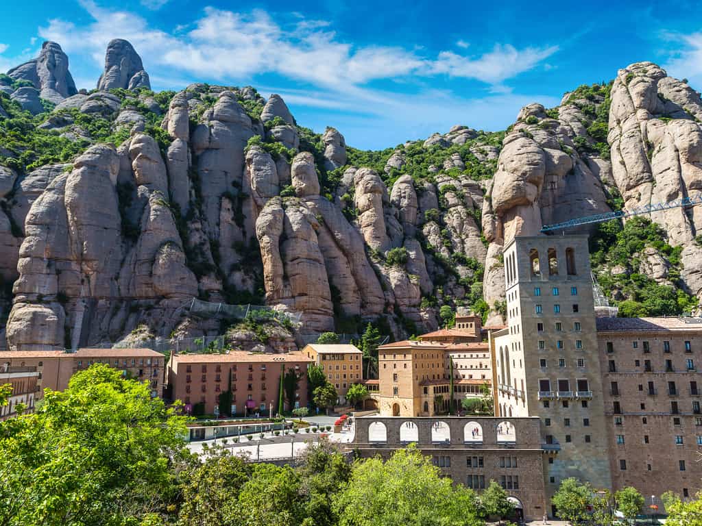 Aerial view of the rugged terrain and peaks of Montserrat, showcasing its natural beauty.