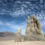 A hand in the sand, inspired by the natural surroundings of the Atacama Desert
