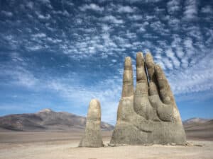 A hand in the sand, inspired by the natural surroundings of the Atacama Desert