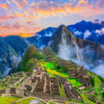 The iconic Sun Gate at Machu Picchu, offering a breathtaking entrance to the ancient city with stunning mountain views