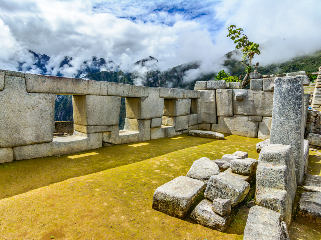 Close-up of the intricate stone walls of Machu Picchu, displaying the Incas' advanced masonry skills